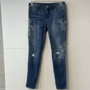 EUC White House Black Market The Skinny floral slightly distressed jeans. Size 6